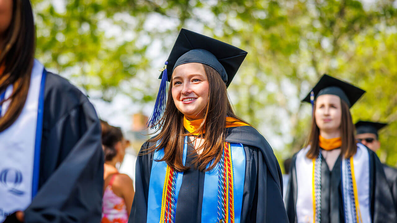 Business student smiling in line