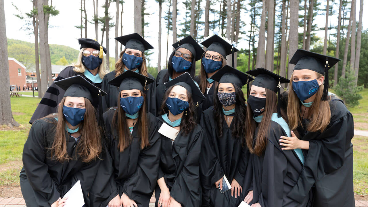 Group of graduates in the pine grove