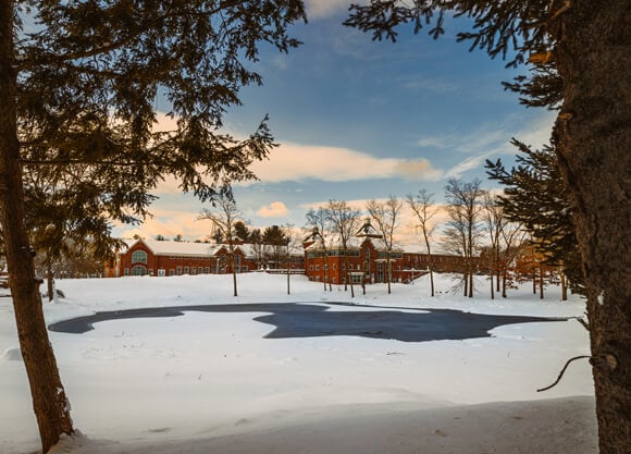 Snow and ice on the pond near the Center for Communications and Engineering