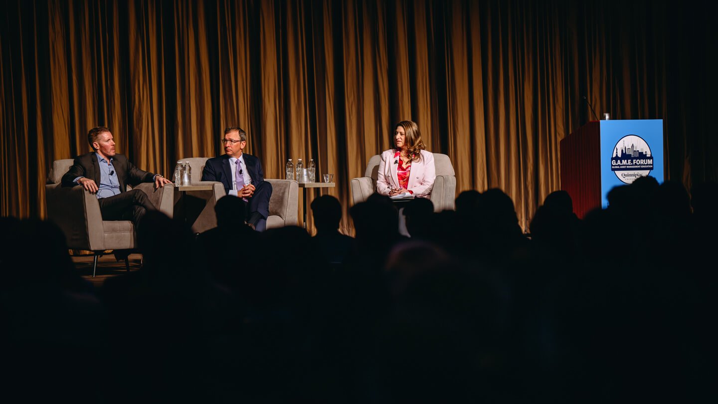 Dean of the Quinnipiac School of Business Holly Raider moderates a panel discussion during GAME Forum.