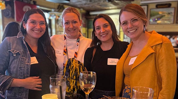 Group of occupational therapy alumni gathering at an event