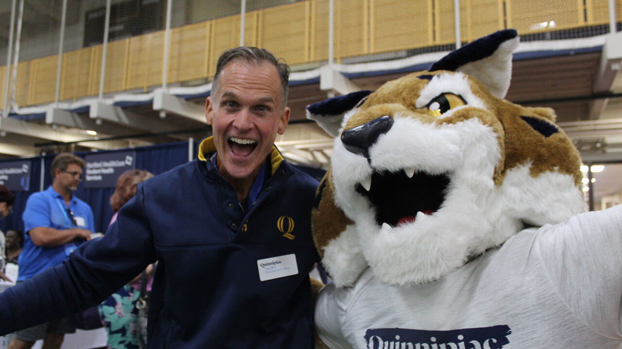 Boomer poses with Tom Ellett