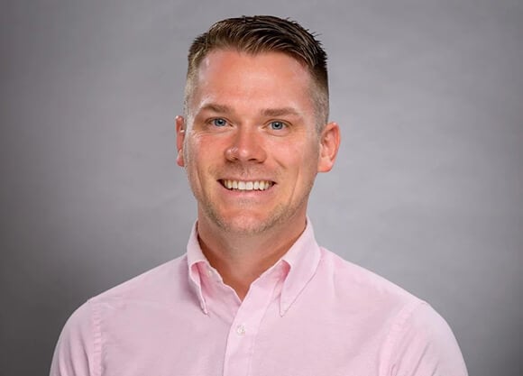 Headshot of Tyler Traister, the director of the accelerated nursing program