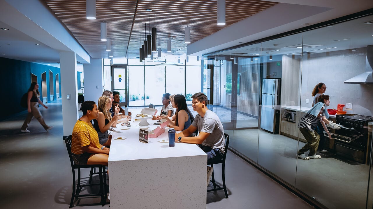 Students talk over cookies