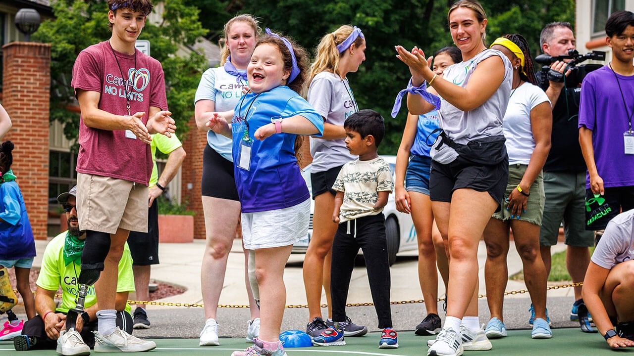 Students and campers celebrate a victory