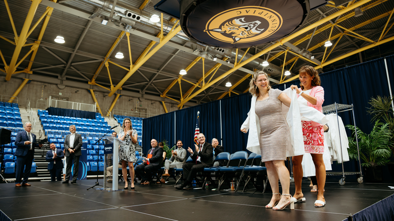 Student receives white coat