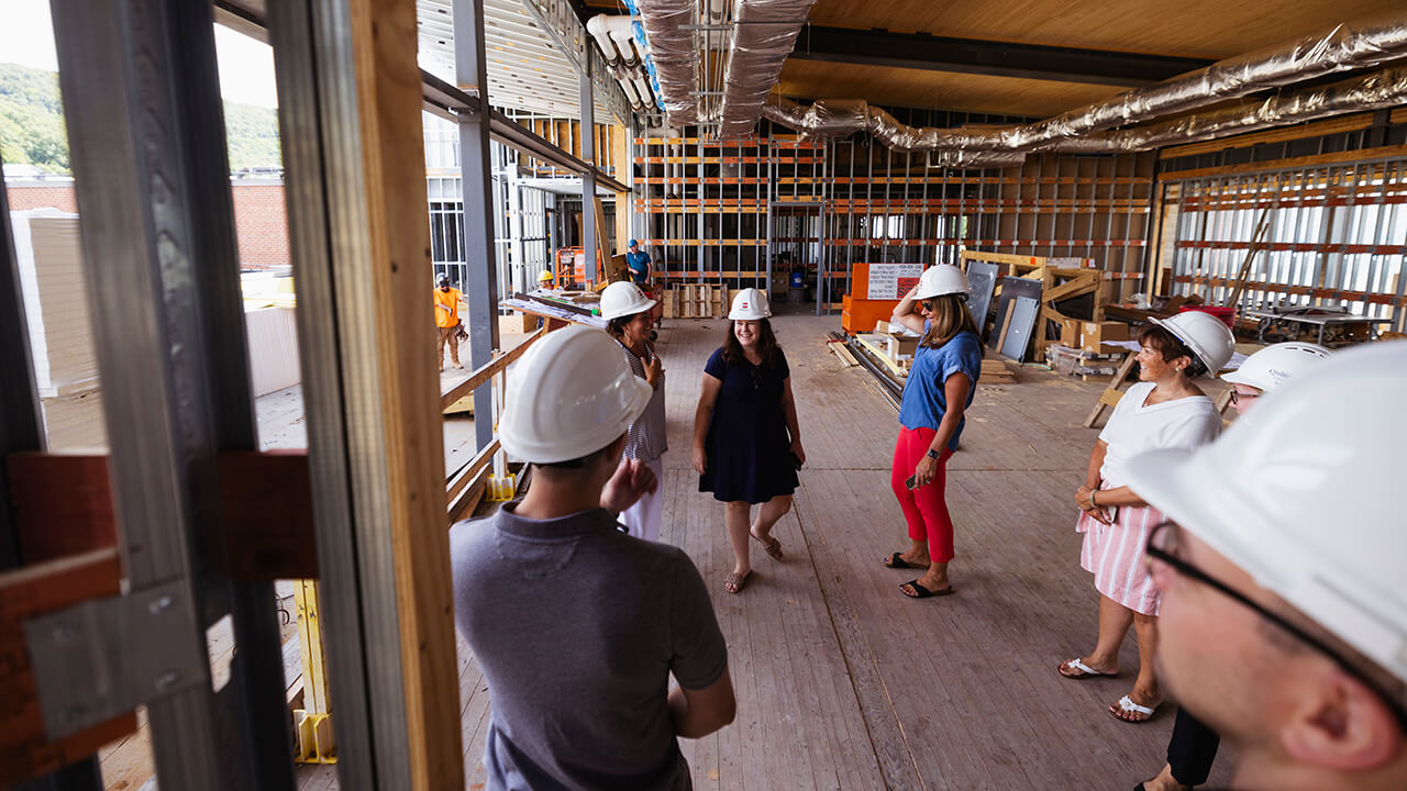 Staff tours the Recreation and Wellness Center.