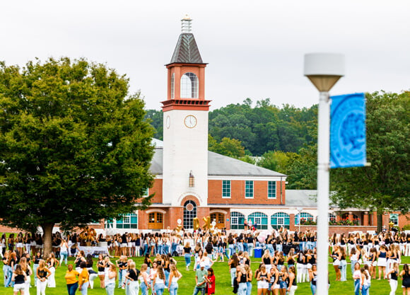 Fraternities and sororities fill the Mount Carmel Campus quad in front of the library.