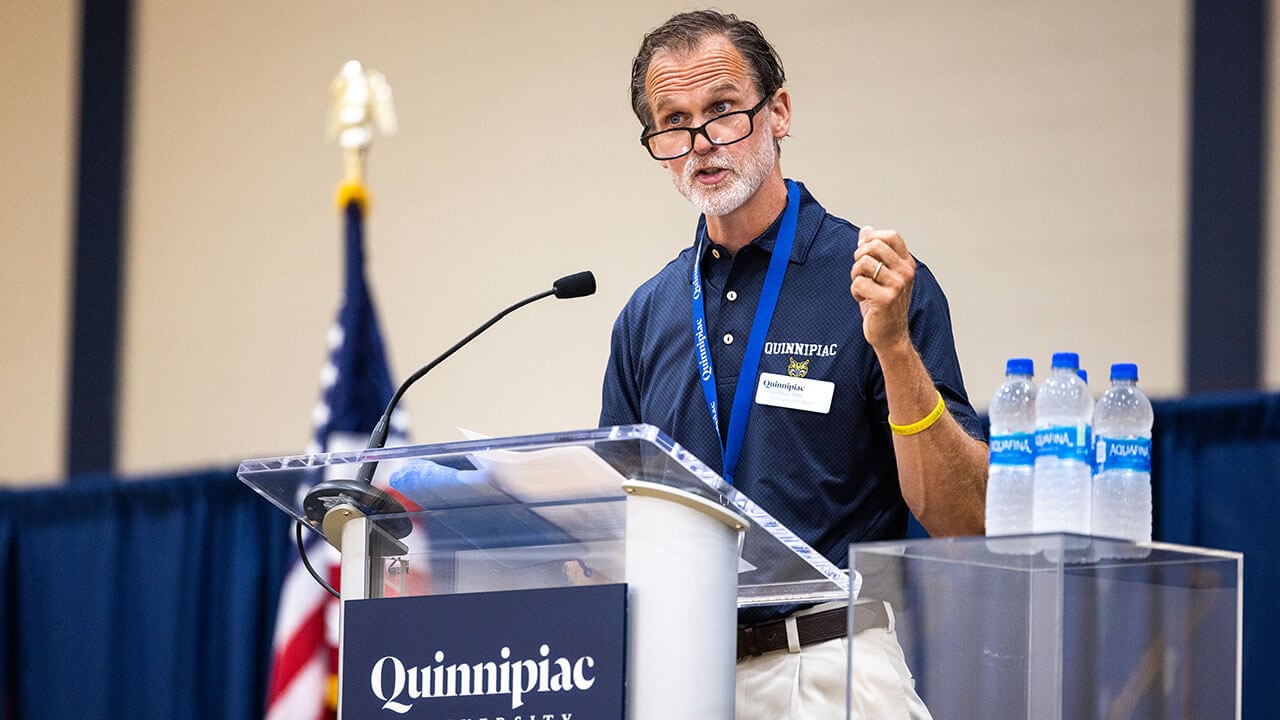 Tom Ellet discusses the Class of 2026 with faculty and staff