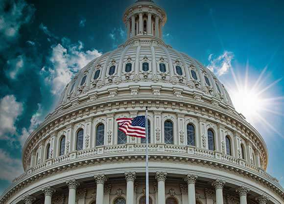 U.S. Capitol with flag