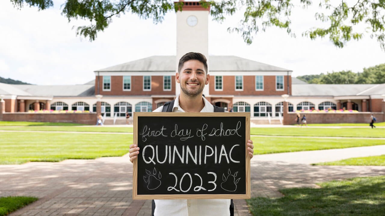 Student takes a moment to capture the first day of school with a photo