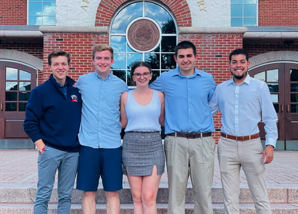 The 5 pre-med ambassadors standing outside of ABL