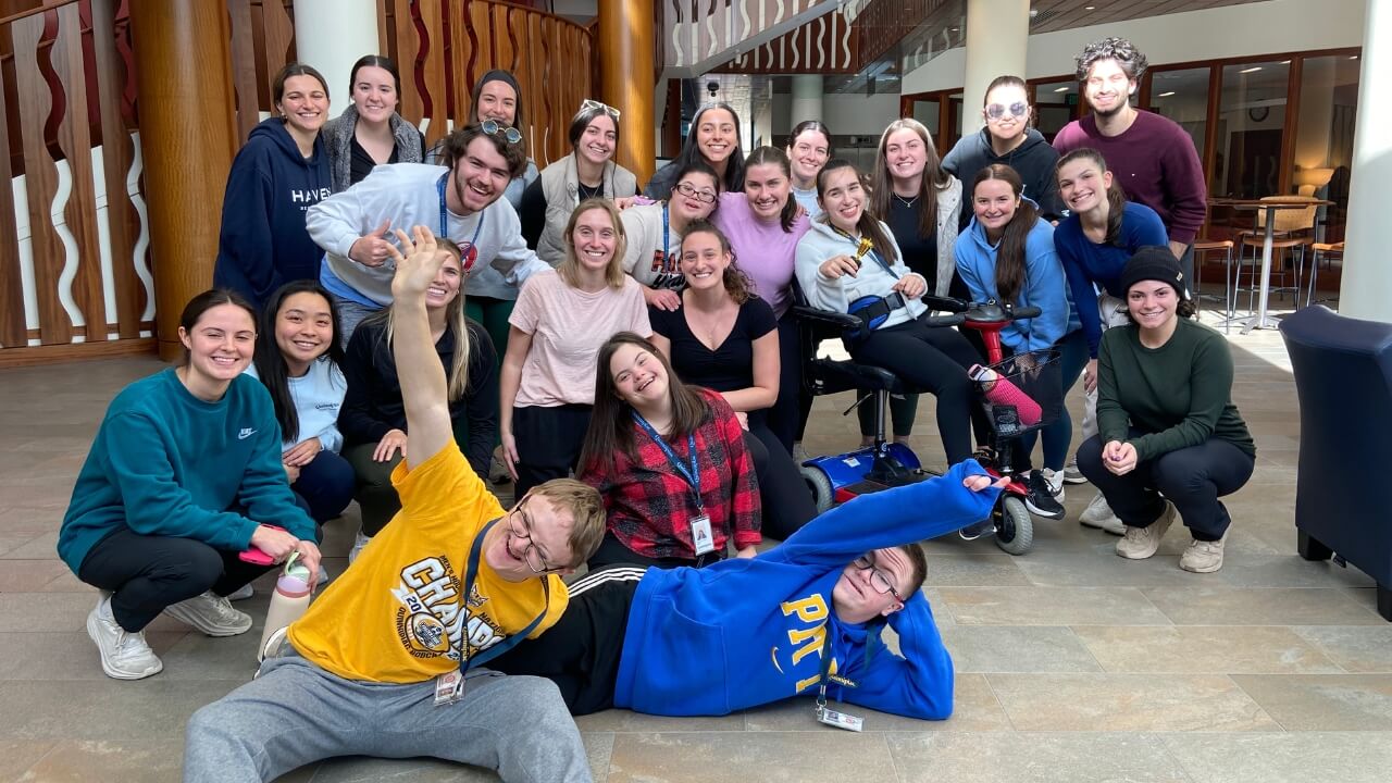 A photo of a large group of students and people a part of the EQUIP student self-care team.
