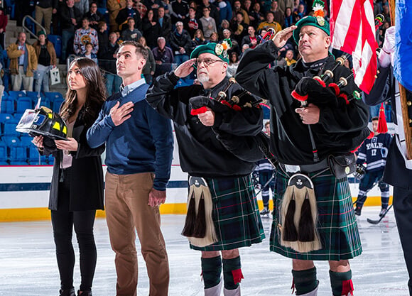 The Mascali family on the ice at Quinnipiac.