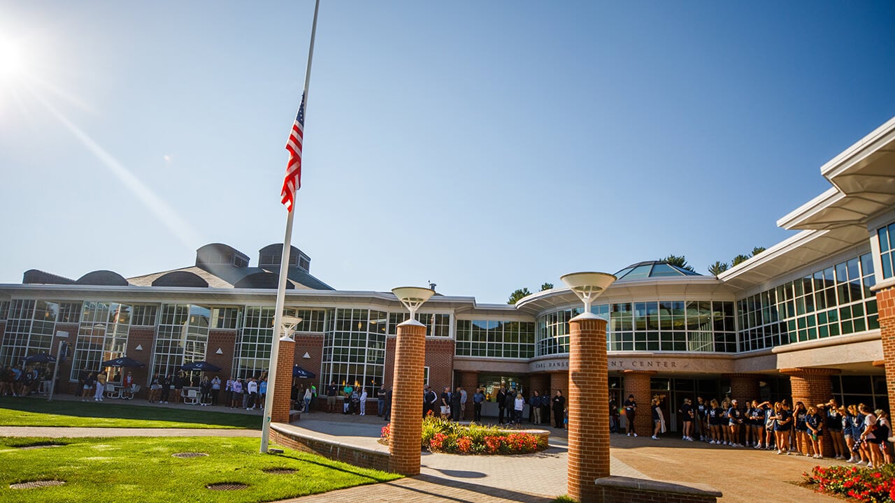 Members of the community gather on the Quad.