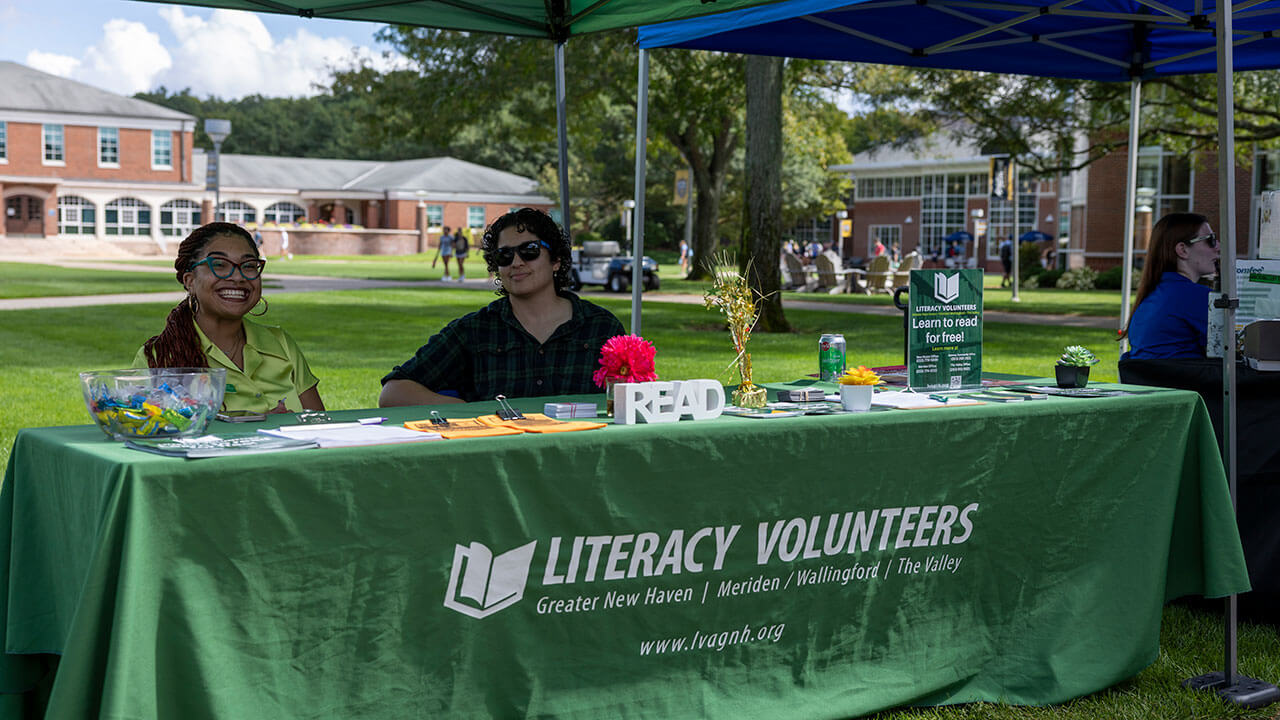 The Literacy Volunteers showcase their organization on the Quad