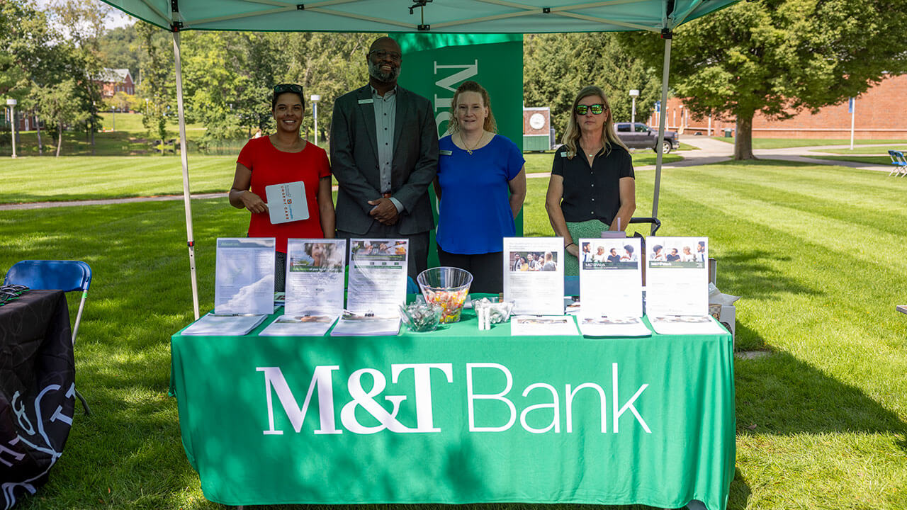 M&T Bank green tent and staff workers