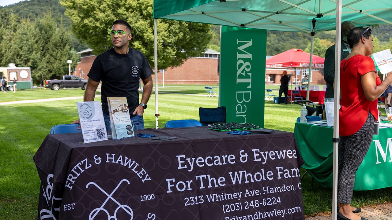 Small business owner looking into the crowd