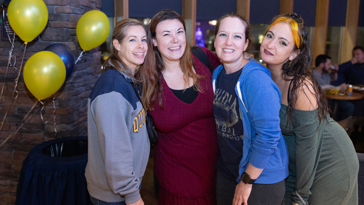 Alumnae taking a group photo