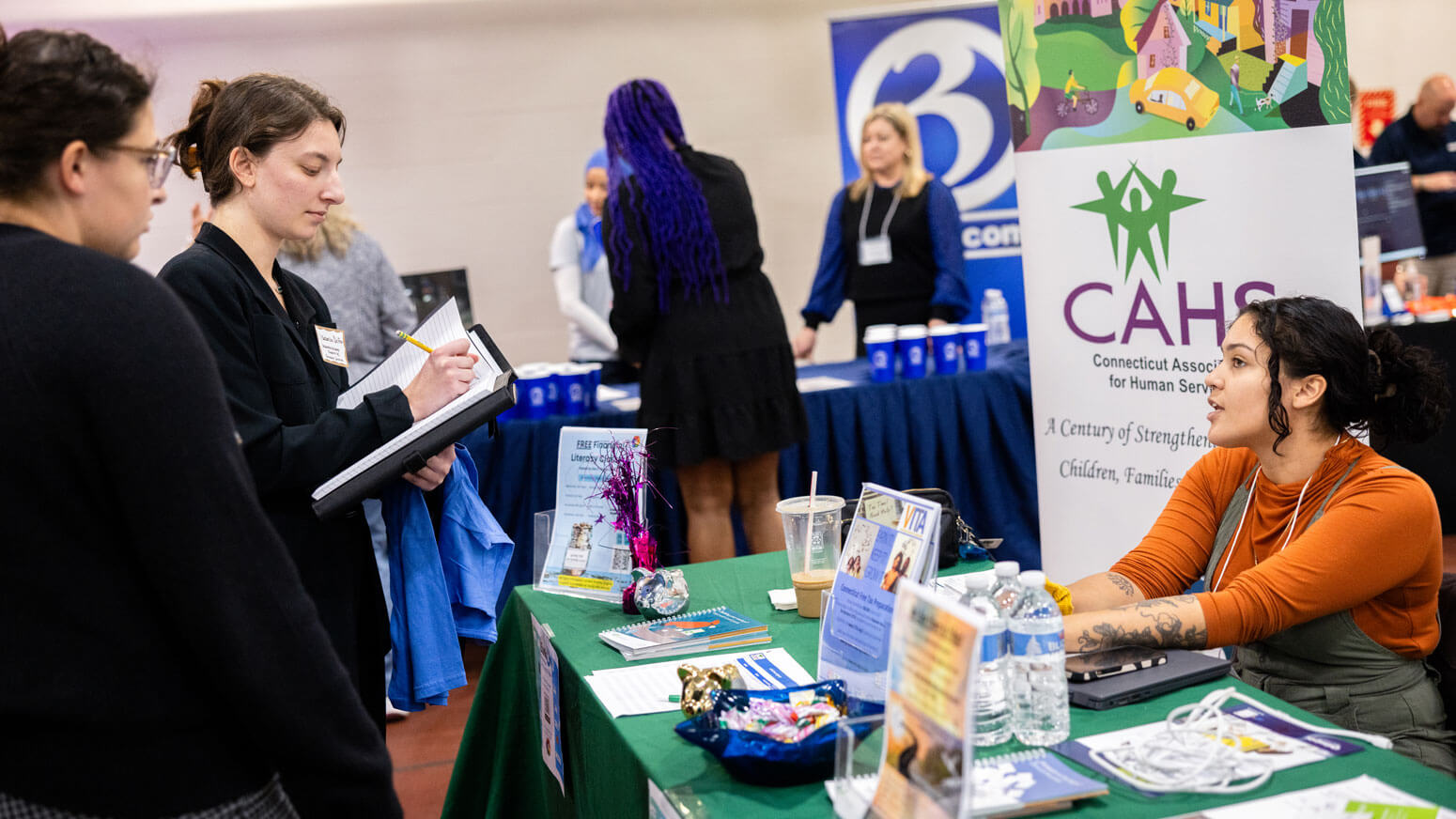 Students interact with brand representatives during the University career fair.