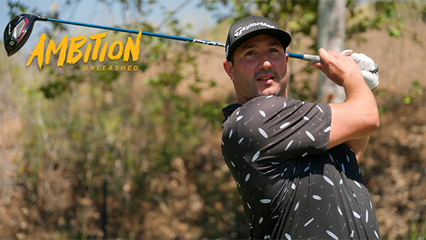 Tyler Brett swings a golf club on a golf course.