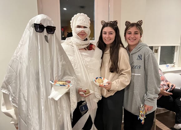 Students wearing Halloween costumes