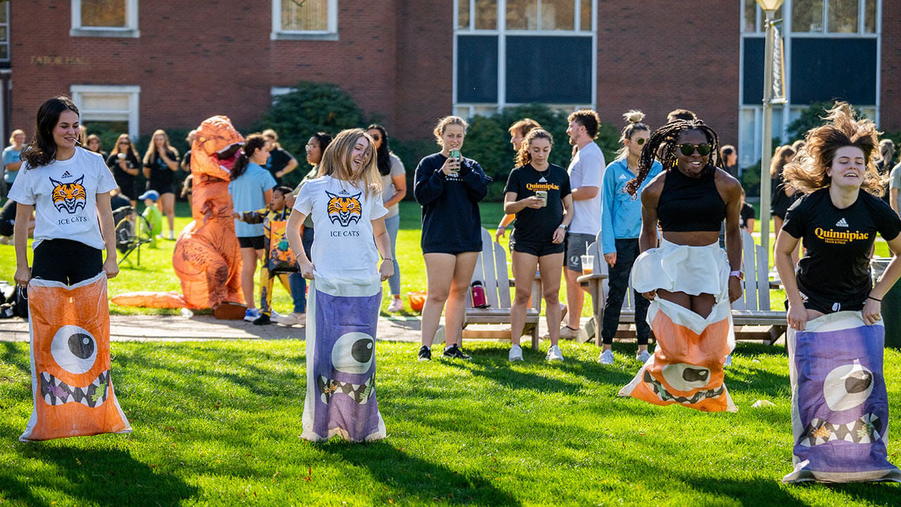 Quinnipiac athletes take part in a sack race