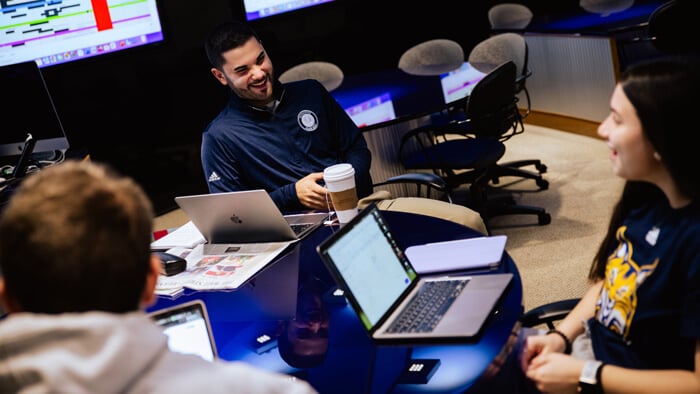 Students discuss during a class.