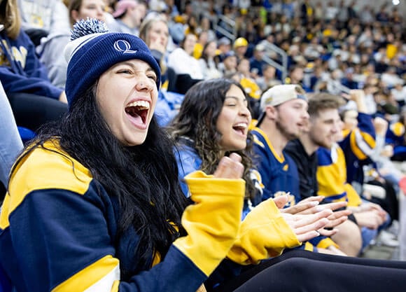 Students decked out in navy and gold at the M&T Bank Arena