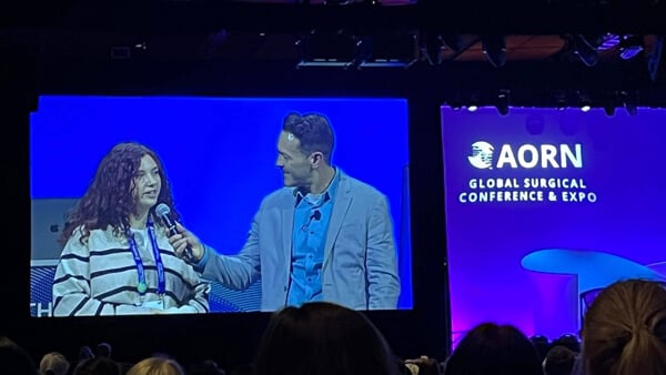 Kimberly	Lebel onstage being interviewed at the Global Surgical Conference & Expo