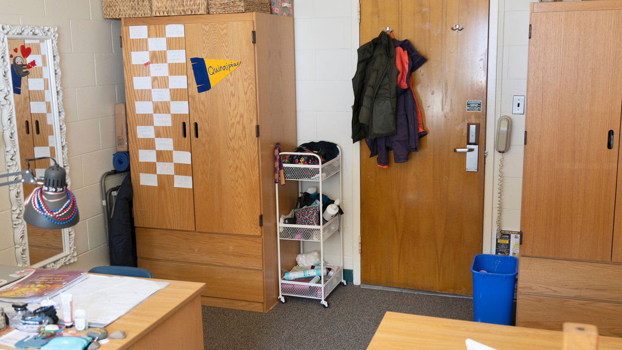 Two closets and two desks within the Irma double bedroom