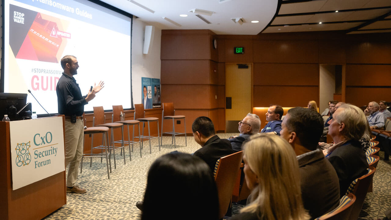 Presenter speaks on stage