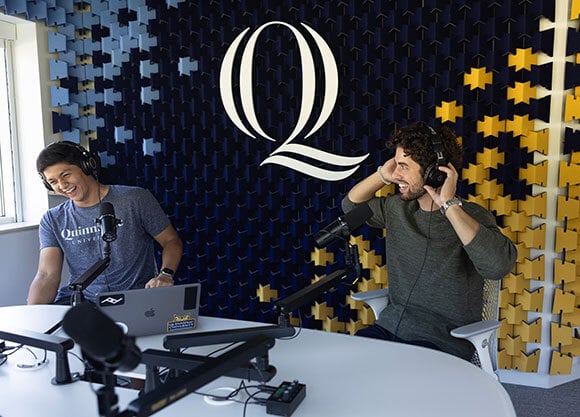 Two students in the School of Communications Podcast Studio