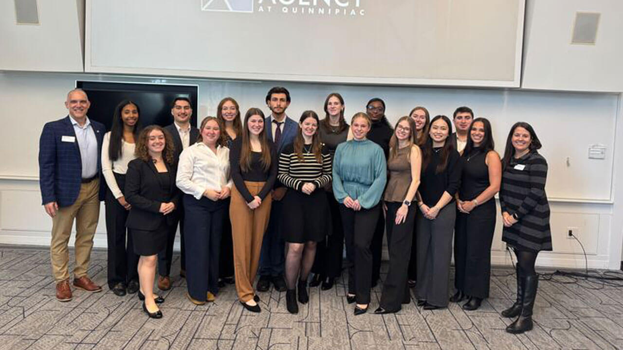 The Agency team poses for a photo