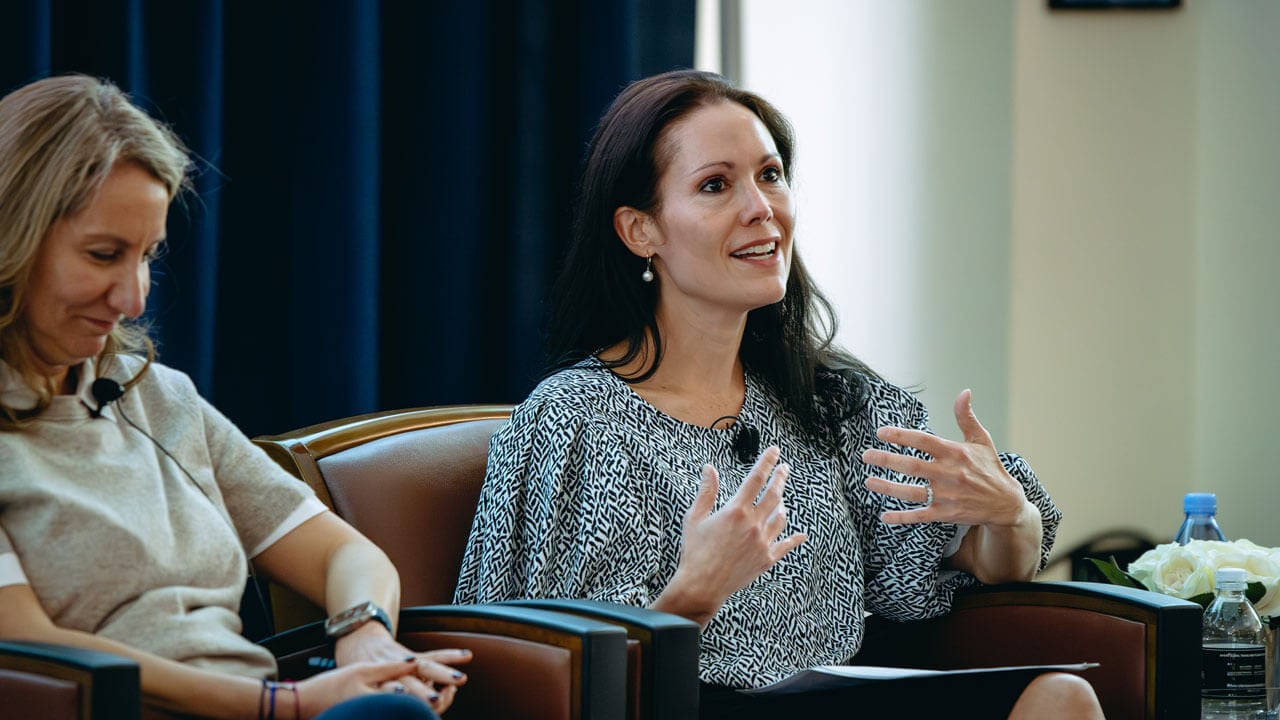 A panelist speaks to the audience.