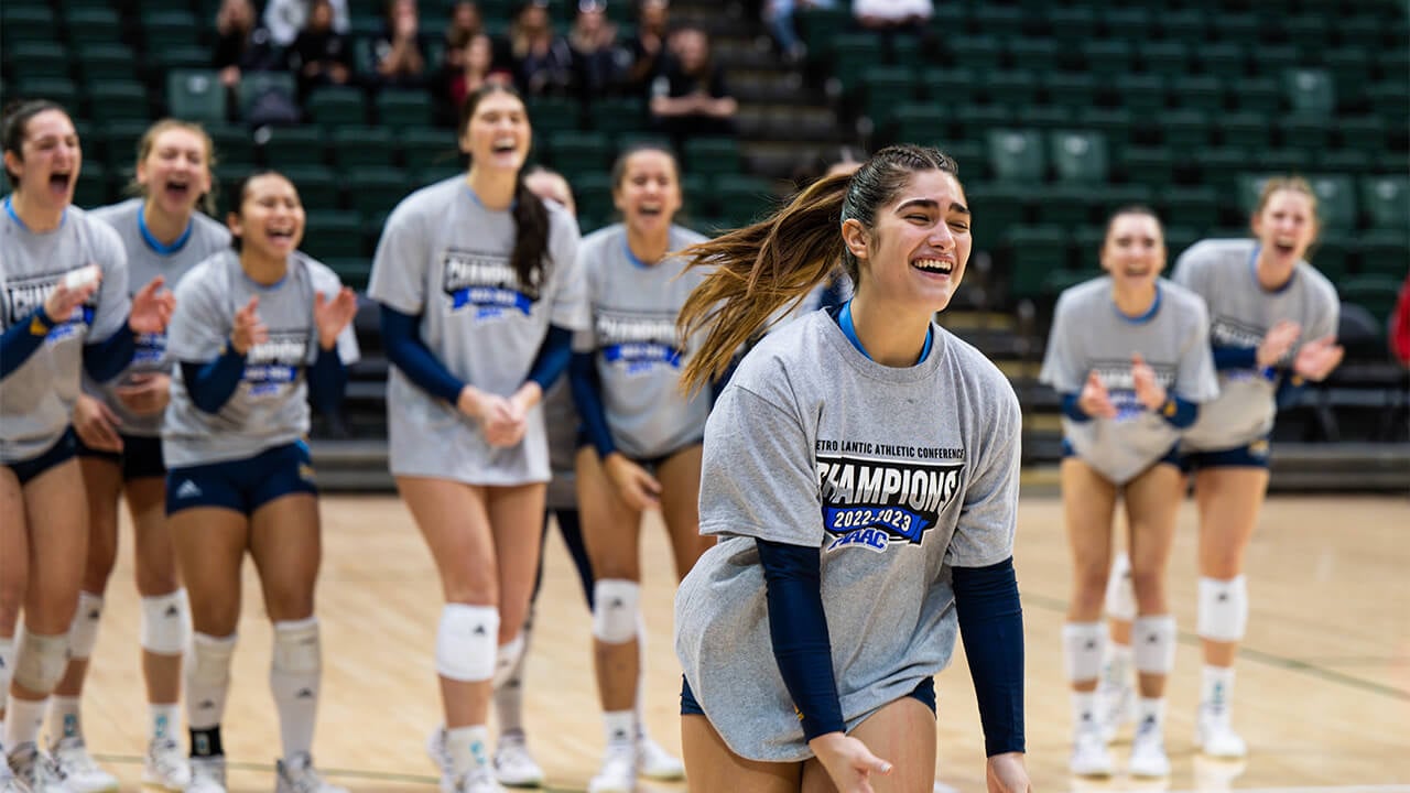 Aryanah Diaz smiling as her name is called to get her trophy.