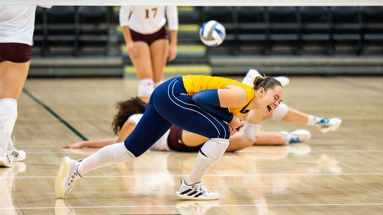 Faavae Kimsel Moe screams in excitement after the team scores a point.