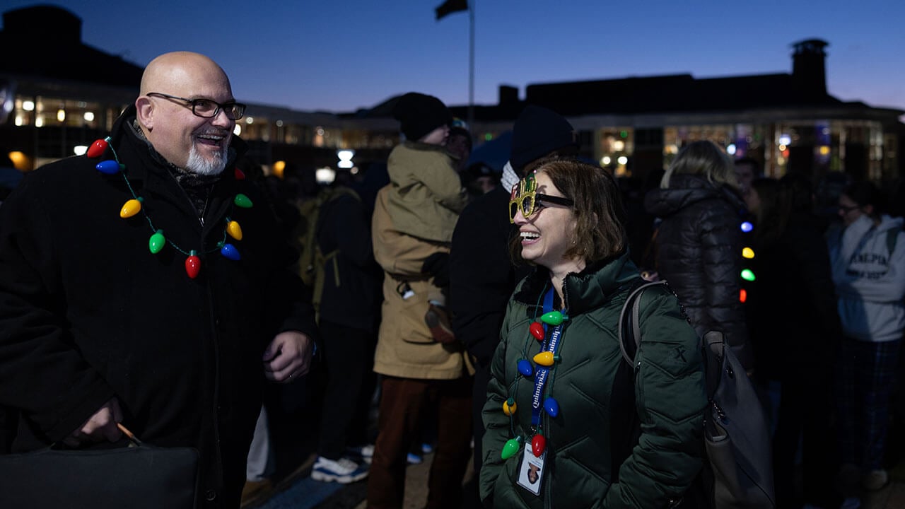 Attendees dressed in holiday spirit wear