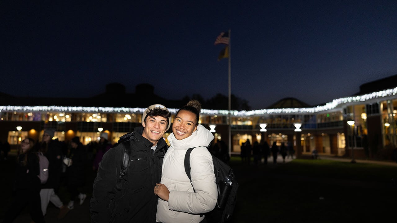 Students enjoying the quad lighting