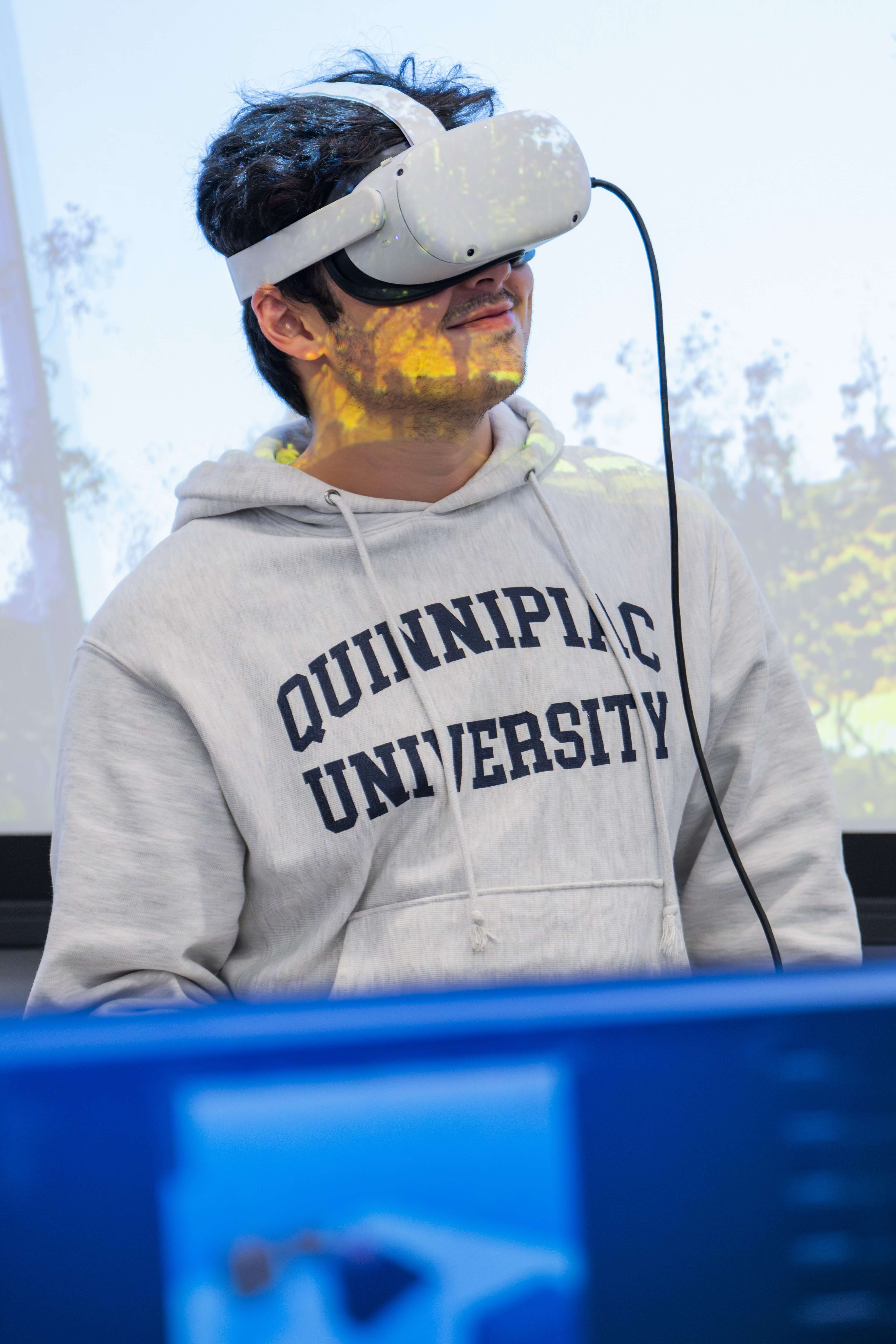 Student wearing a VR headset in the classroom