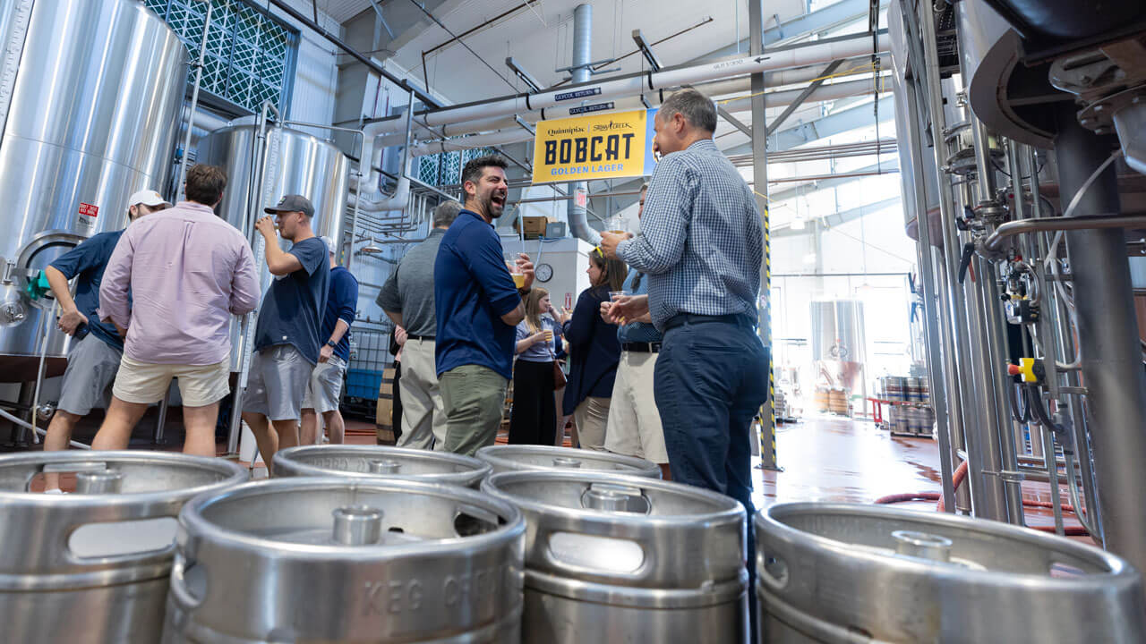 People enjoy the bobcat golden lager beer at Stony Creek Brewery.