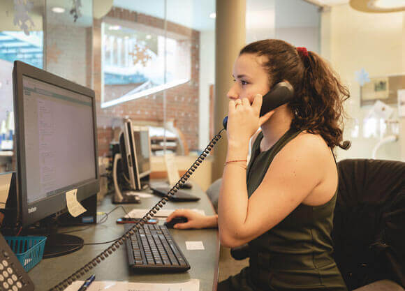 Student employee working at the technology center.