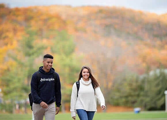 Students walk across the Quad