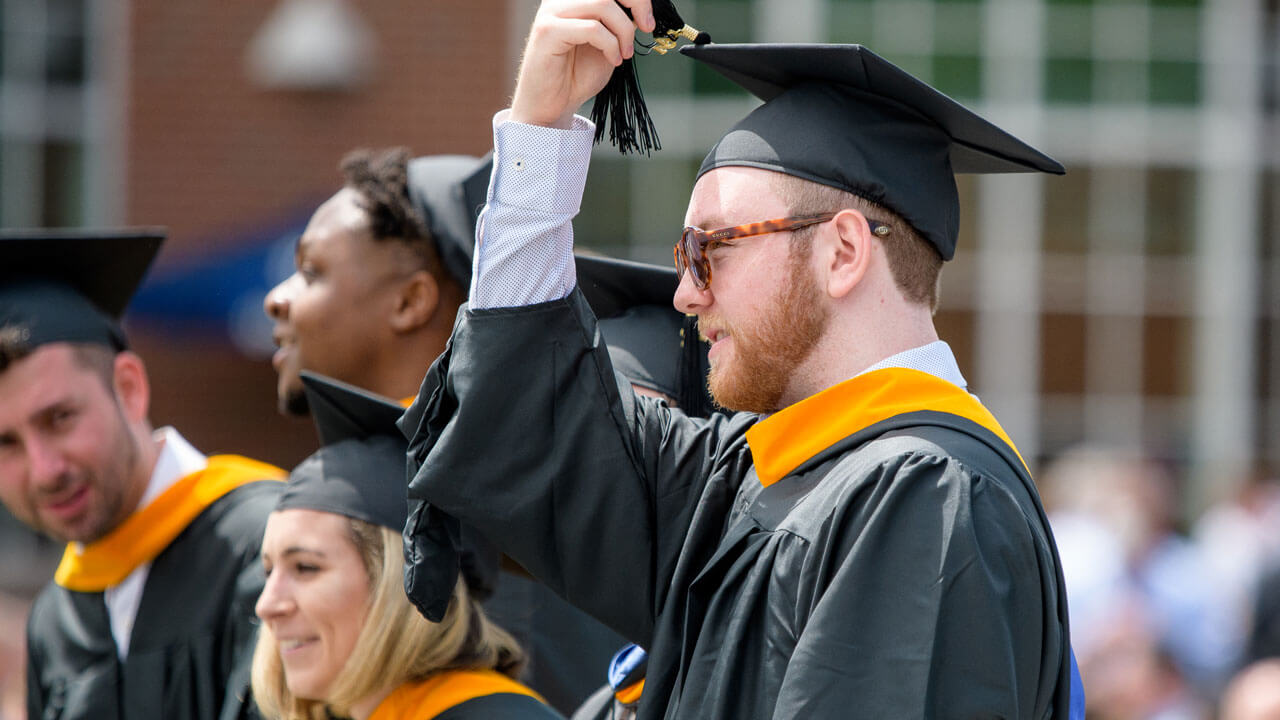 Graduating student moves tassel