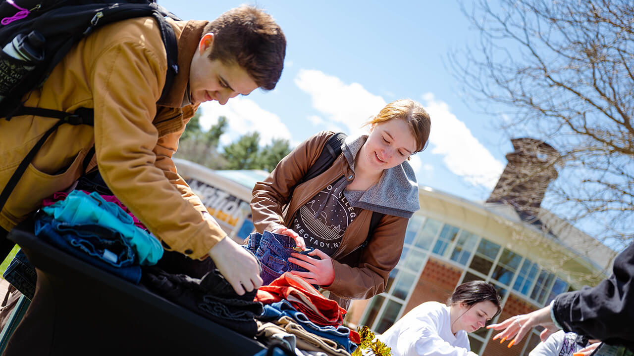 A student looks at jeans.