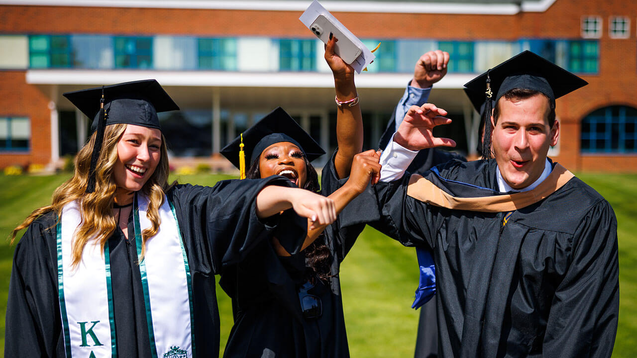 Graduates celebrate on line with their friends