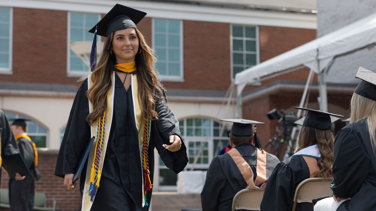 SOB Graduate walks from stage