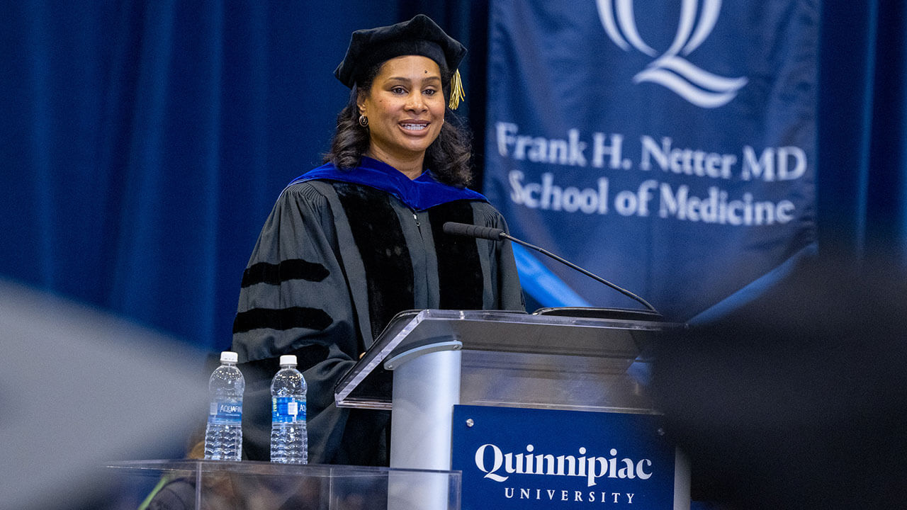 Speaker at med graduation podium