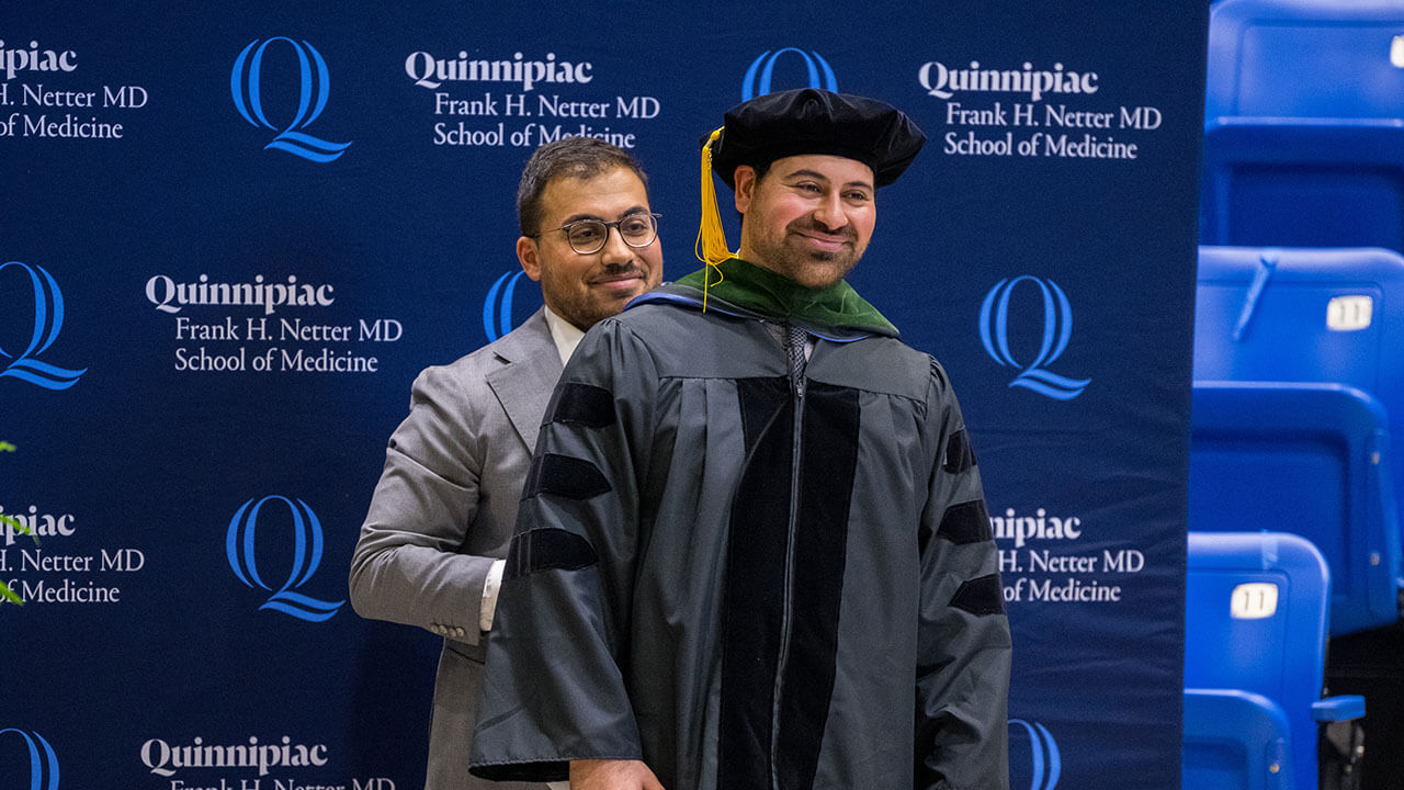 Med grad student being hooded