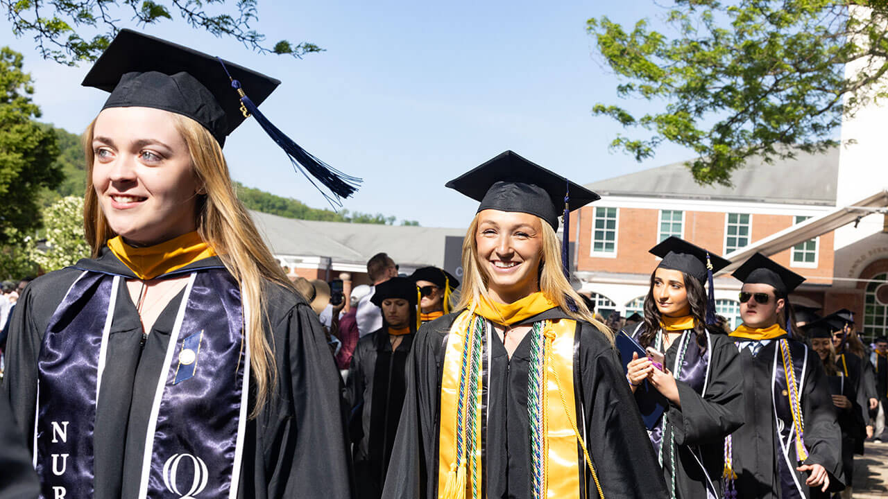 graduates searching the audience for faces they recognize